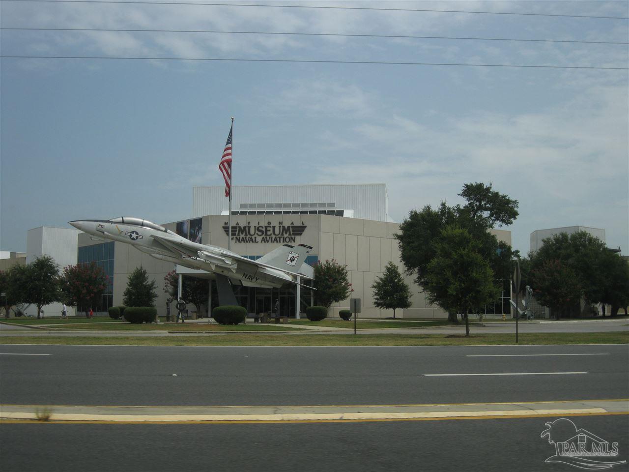 7787 Burnside Loop Pensacola, FL 32526 - Photo 22 of 32 a view of a building with a yard