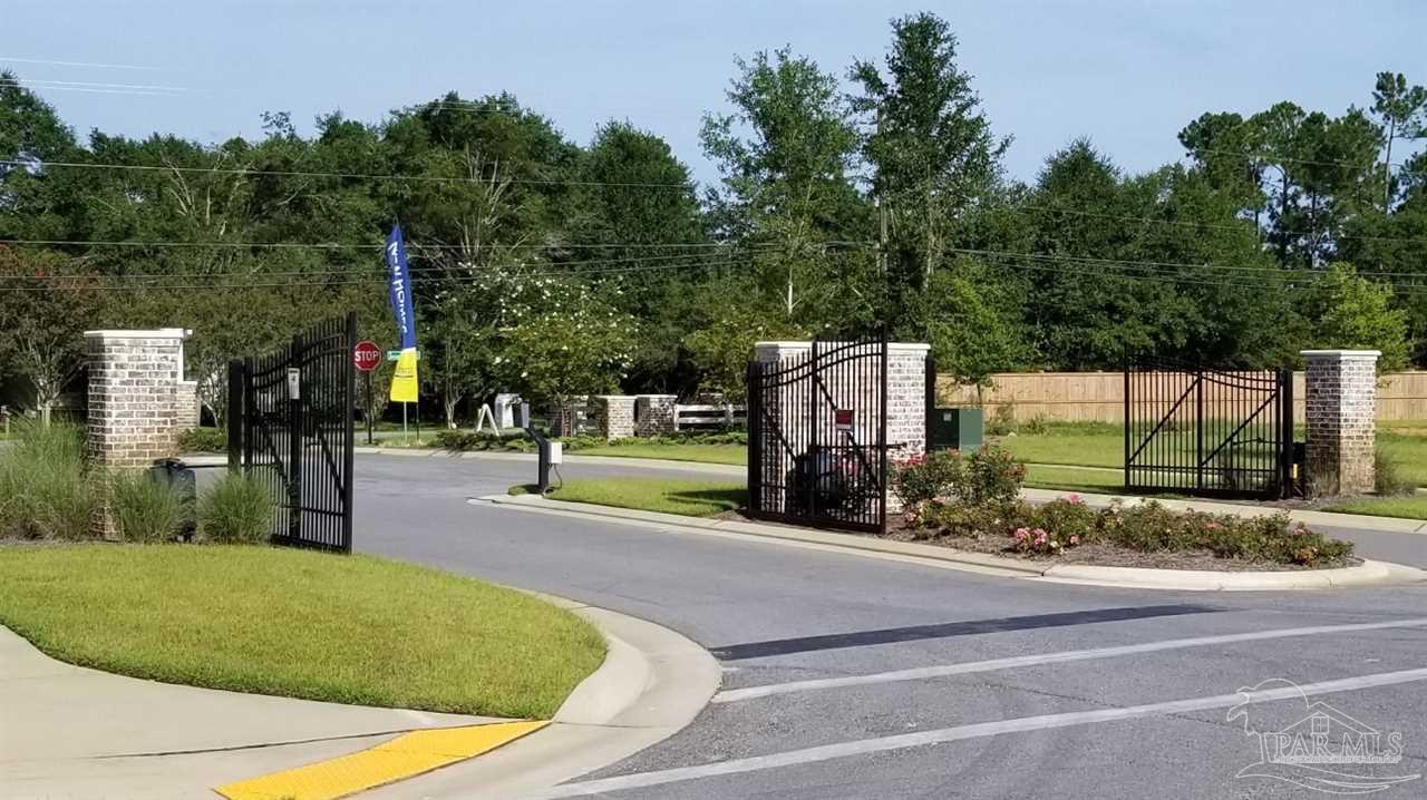 7787 Burnside Loop Pensacola, FL 32526 - Photo 4 of 32 a view of a park with swings and slides