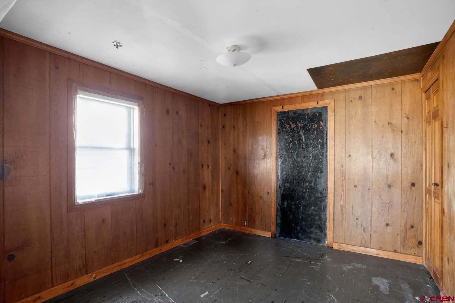 501 East 2nd Street Cortez, CO 81321 - Photo 12 of 30 an empty room with windows