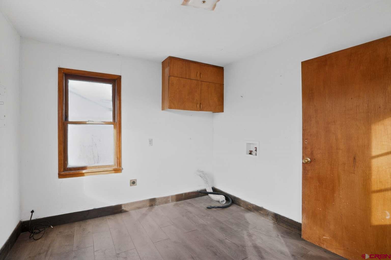 501 East 2nd Street Cortez, CO 81321 - Photo 28 of 30 an empty room with a window
