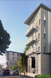 a view of a building with a street