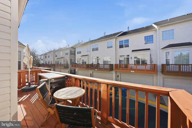 a view of a balcony with chairs