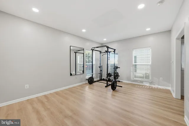 a view of room with gym equipment