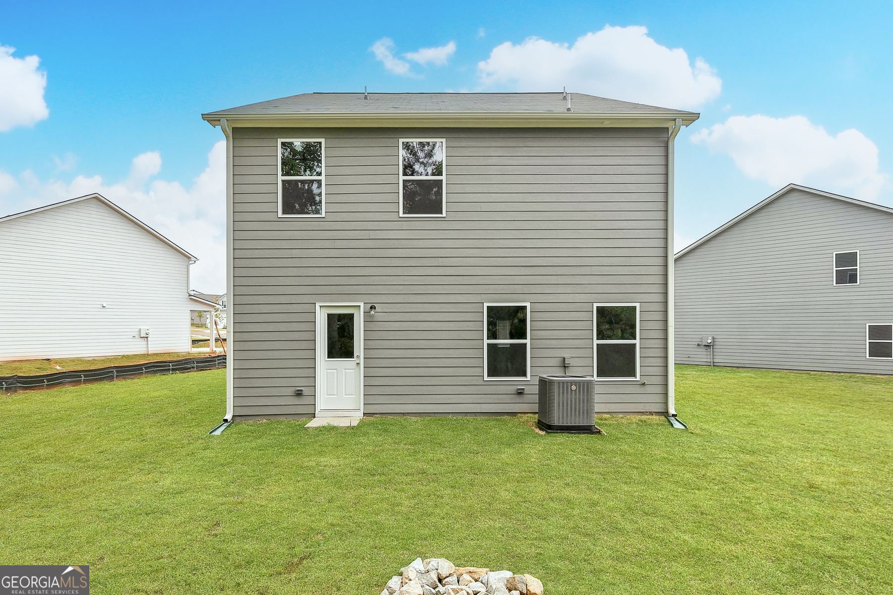621 Slate Road Conyers, GA 30013 - Photo 3 of 21 a view of a backyard of the house