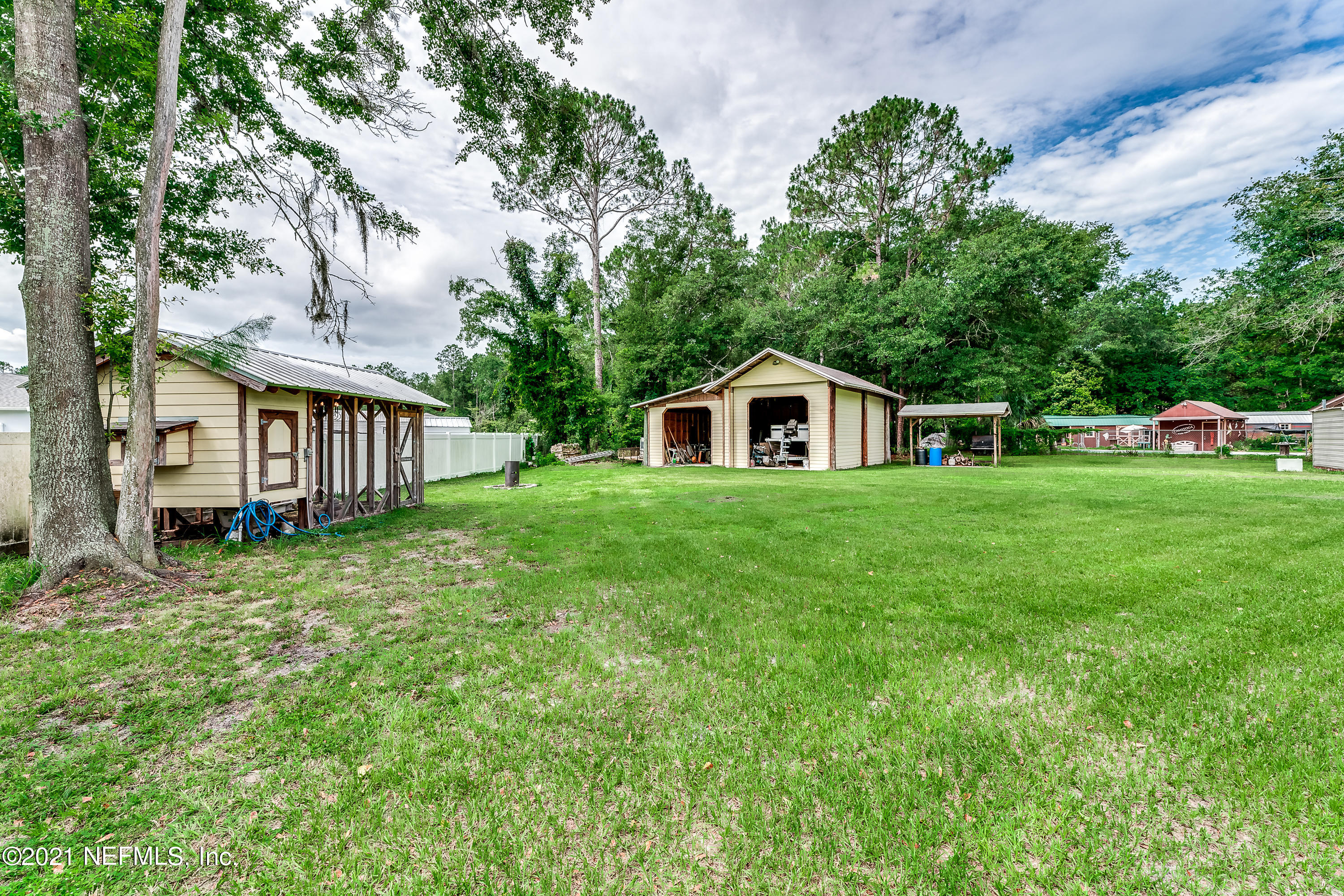 1123 Cactus Cut Road Middleburg, FL 32068 - Photo 11 of 66 a house view with a garden space