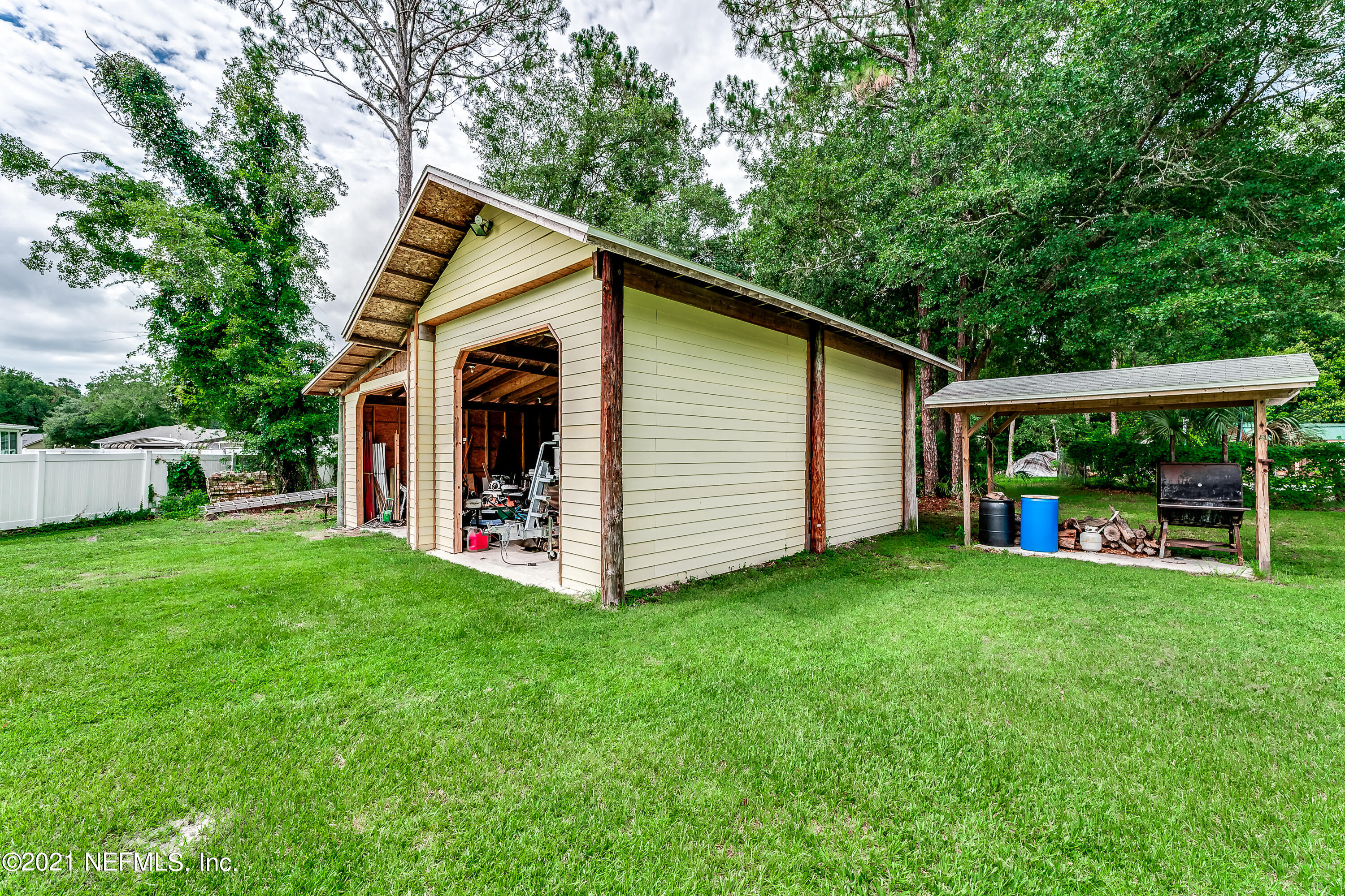 1123 Cactus Cut Road Middleburg, FL 32068 - Photo 14 of 66 a view of a house with backyard and garden