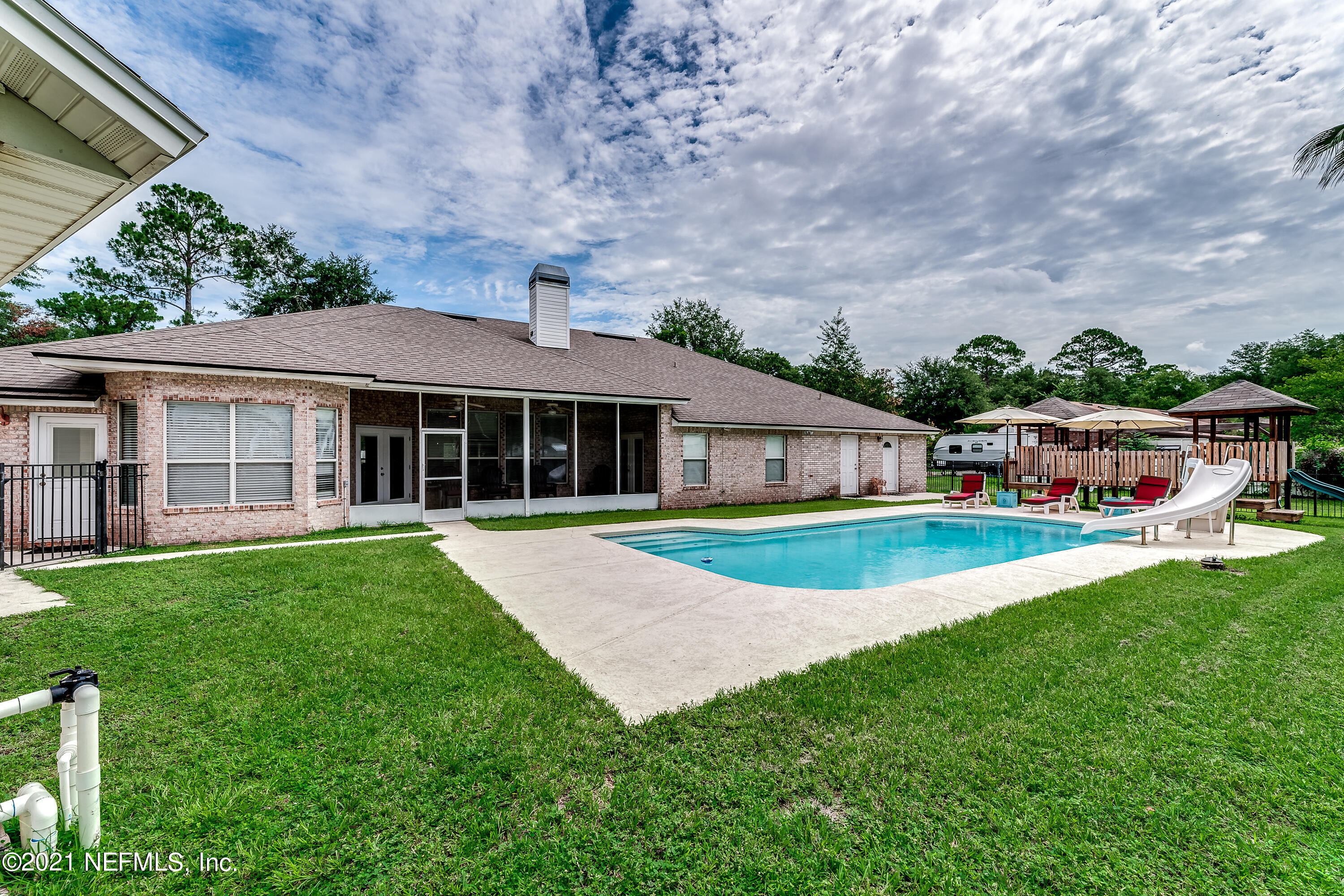 1123 Cactus Cut Road Middleburg, FL 32068 - Photo 15 of 66 a front view of house with yard and green space