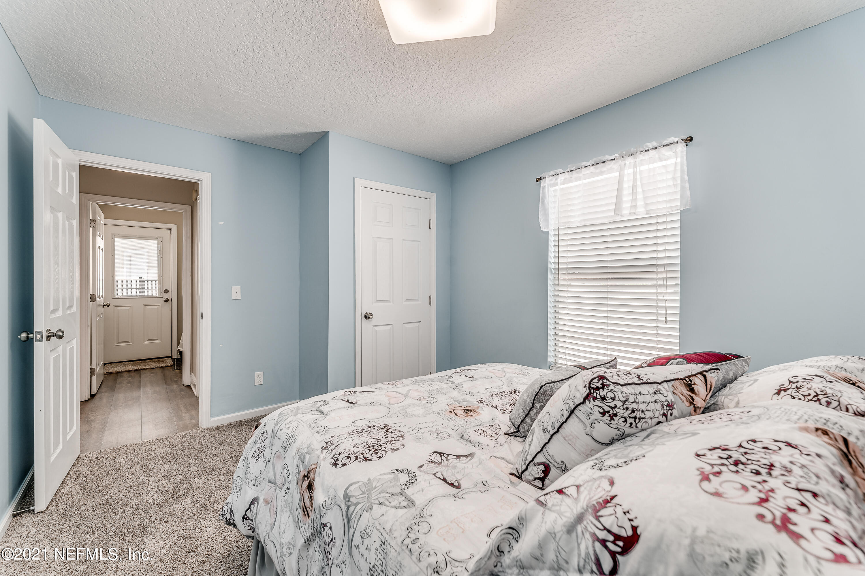 1123 Cactus Cut Road Middleburg, FL 32068 - Photo 38 of 66 a bedroom with a bed and a window