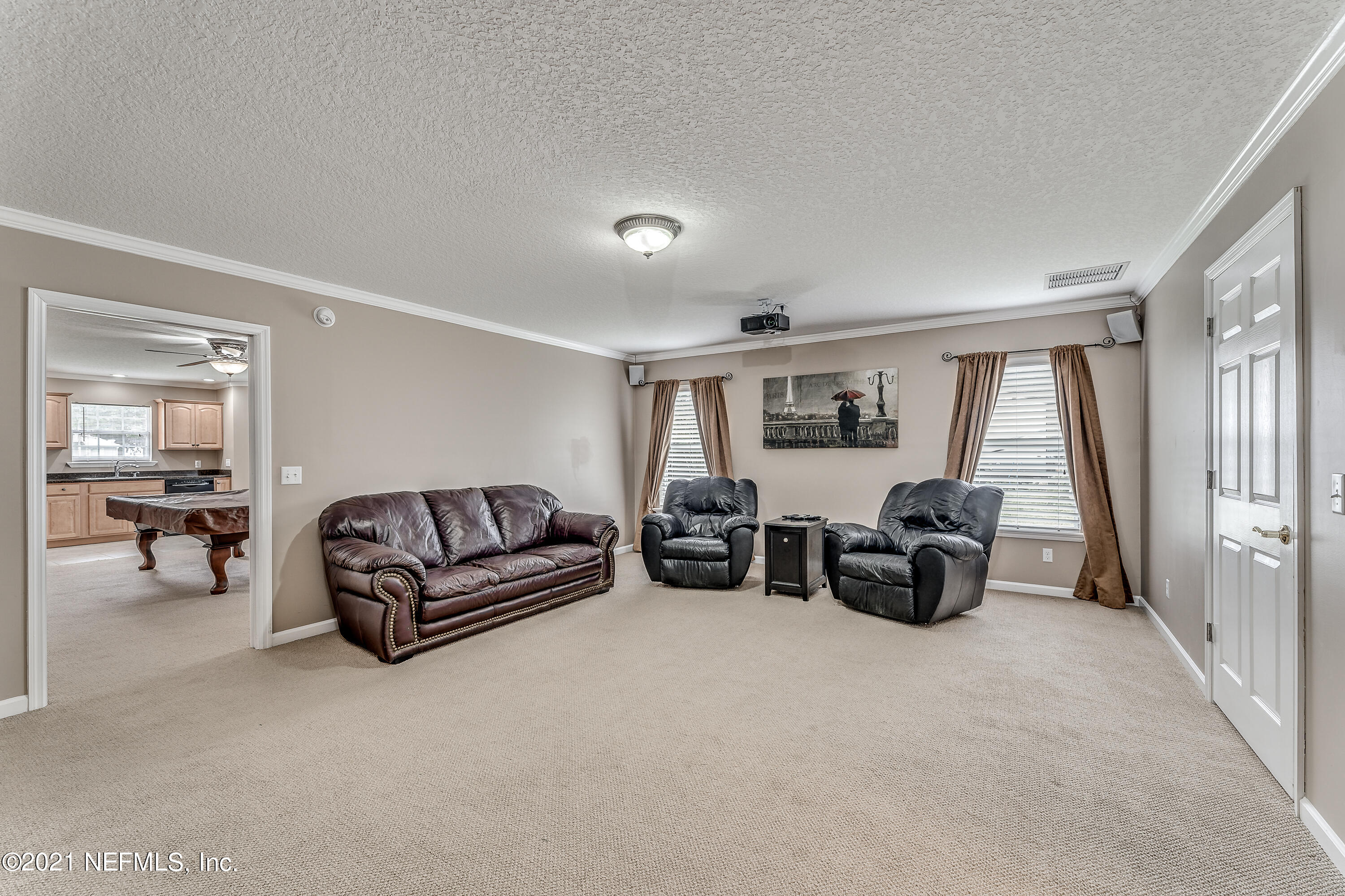 1123 Cactus Cut Road Middleburg, FL 32068 - Photo 58 of 66 a living room with furniture and a window