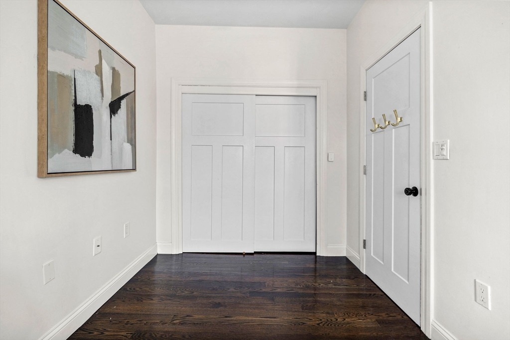 296 East 8th Street, Unit 3 Boston, MA 02127 - Photo 16 of 29 a view of an entryway with wooden floor