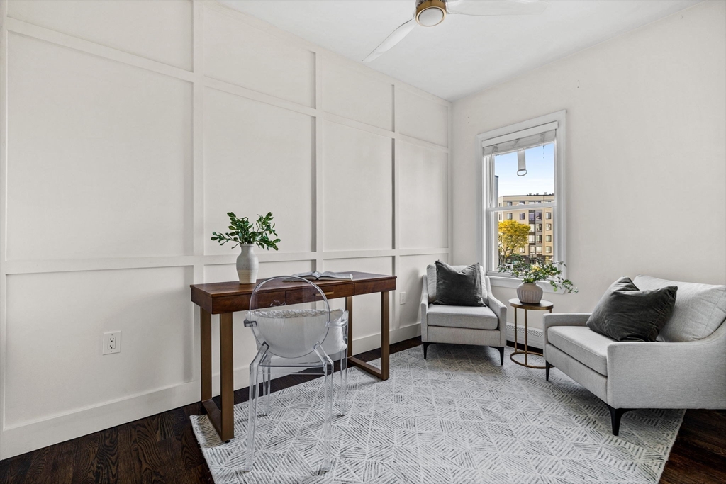 296 East 8th Street, Unit 3 Boston, MA 02127 - Photo 17 of 29 a living room with furniture and wooden floor