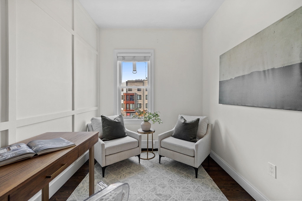 296 East 8th Street, Unit 3 Boston, MA 02127 - Photo 18 of 29 a living room with furniture and a window
