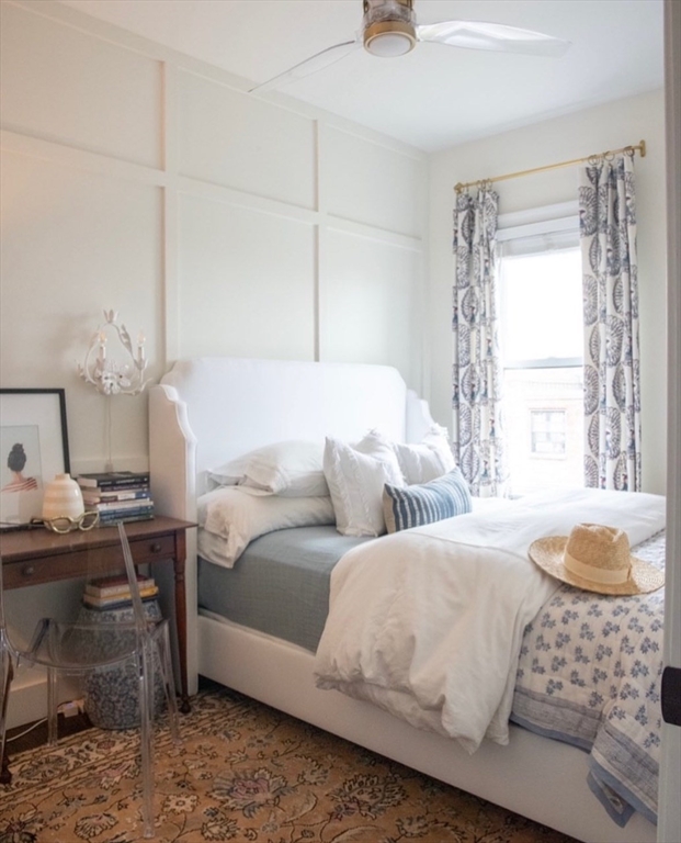 296 East 8th Street, Unit 3 Boston, MA 02127 - Photo 19 of 29 a bedroom with a bed and a window