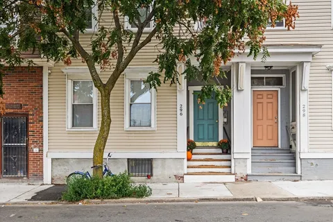 a small garden in front of a house