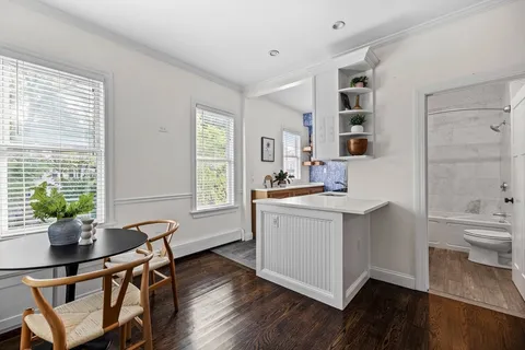 a kitchen that has a sink and a stove