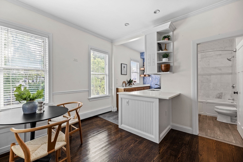 296 East 8th Street, Unit 3 Boston, MA 02127 - Photo 6 of 29 a kitchen that has a sink and a stove