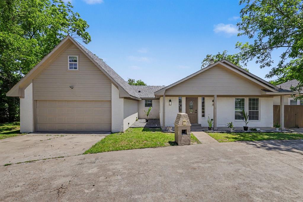 307 Dixon Street Terrell, TX 75160 - Photo 1 of 32 Exterior facade featuring white stucco and neutral siding