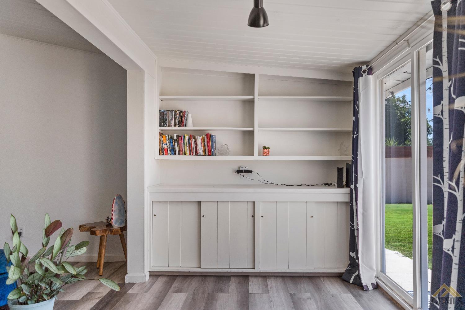 Undisclosed Address Bakersfield, CA 93305 - Photo 14 of 33 a view of cabinets with wooden floor and cabinet