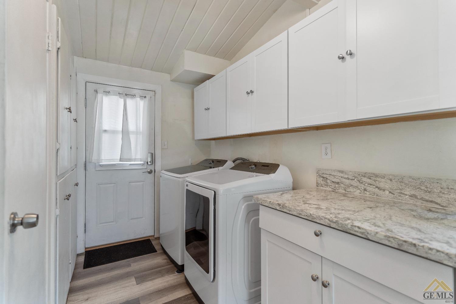 Undisclosed Address Bakersfield, CA 93305 - Photo 24 of 33 a utility room with washer and dryer