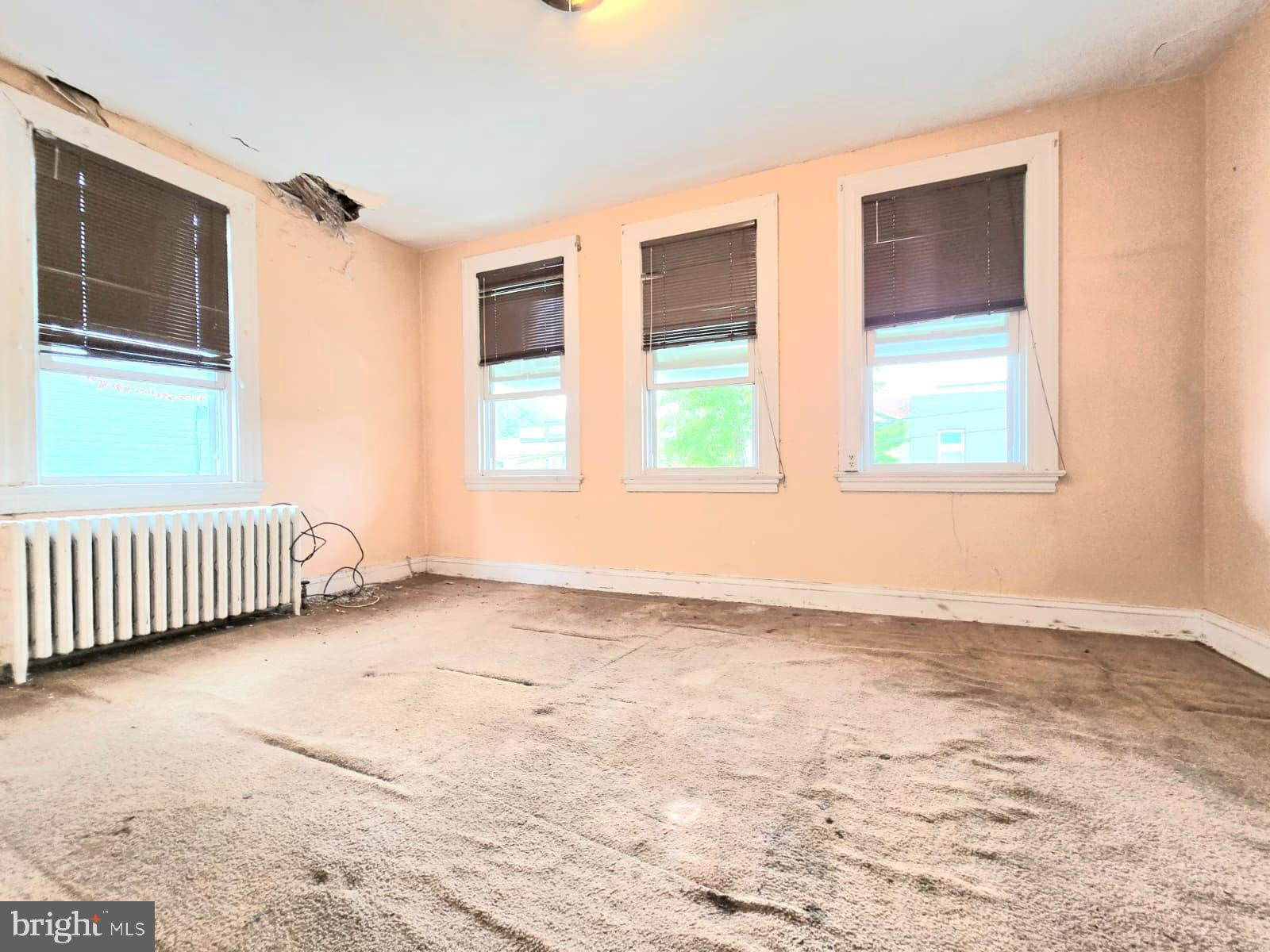 613 Roxboro Place Northwest Washington, DC 20011 - Photo 12 of 17 a view of an empty room with a window