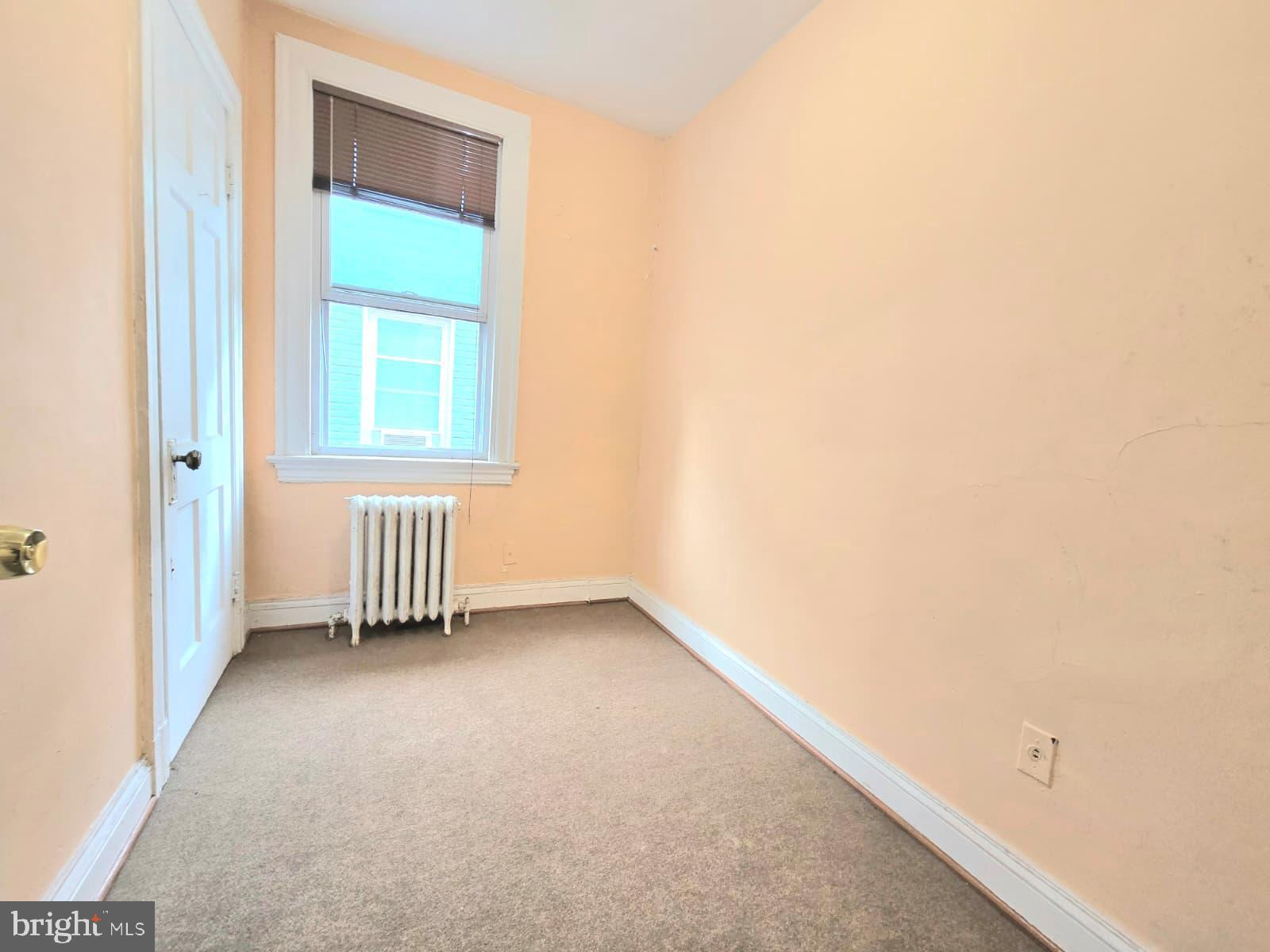 613 Roxboro Place Northwest Washington, DC 20011 - Photo 14 of 17 an empty room with windows