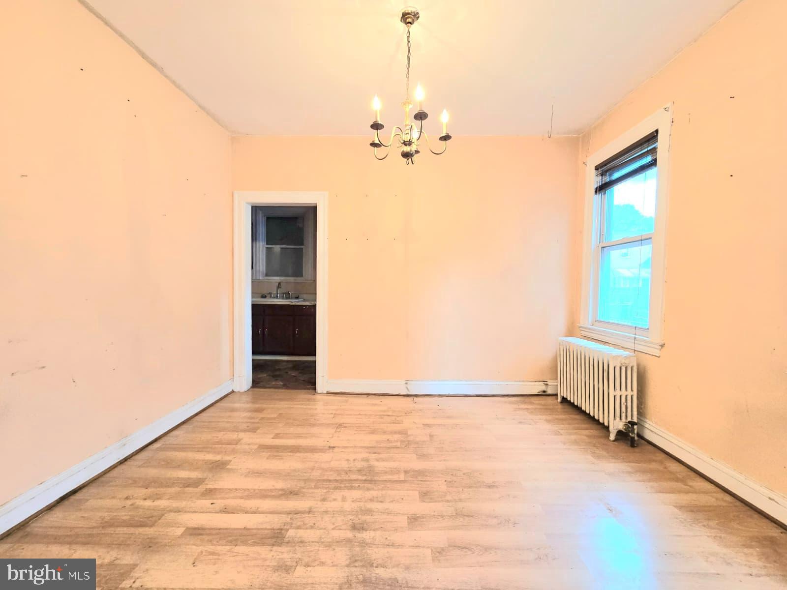 613 Roxboro Place Northwest Washington, DC 20011 - Photo 5 of 17 a view of an empty room with a window