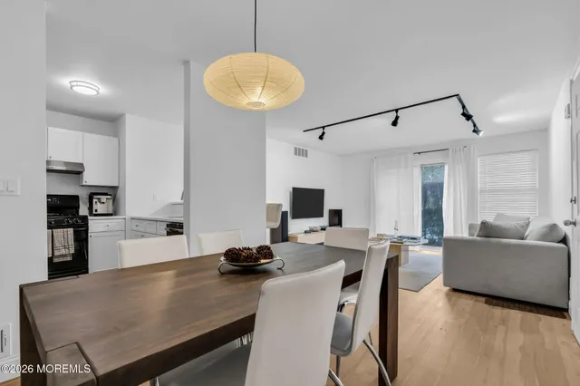 a view of a dining room with furniture