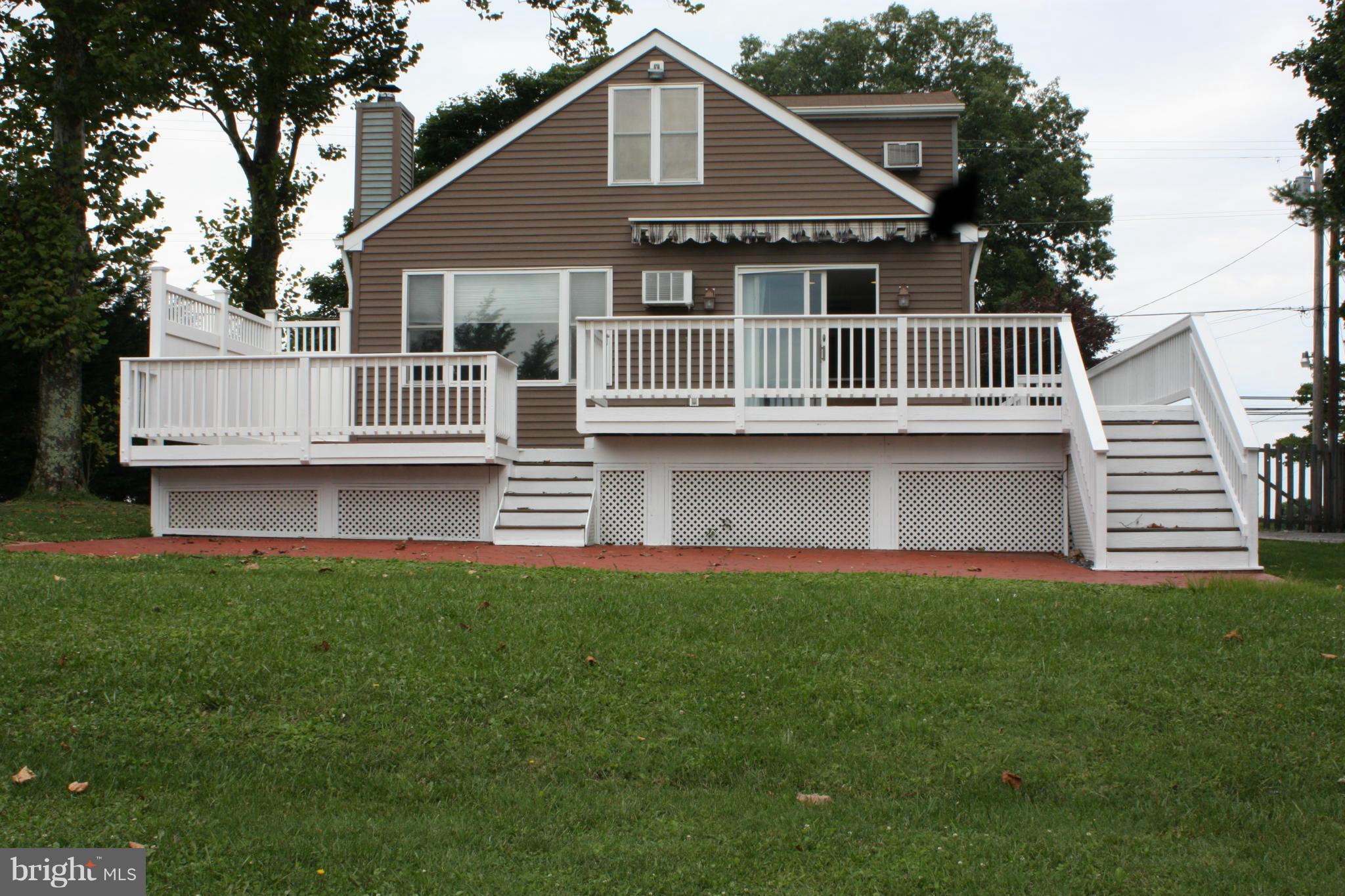 9210 Damascus Road Damascus, MD 20872 - Photo 20 of 25 Rear View of Home, Deck & Patio