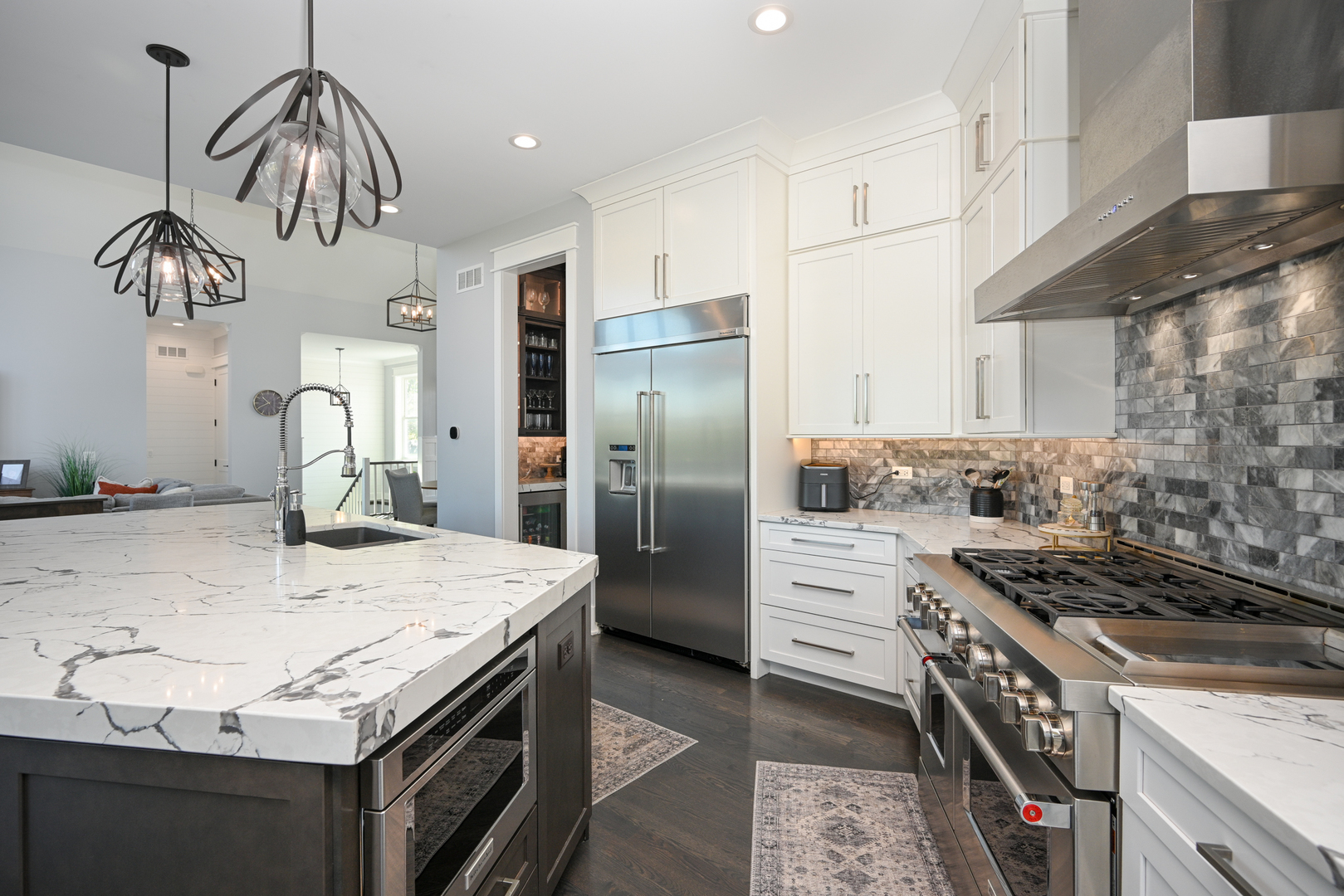 5-n107 Burr Road St. Charles, IL 60175 - Photo 13 of 54 a kitchen with granite countertop a sink stainless steel appliances and cabinets