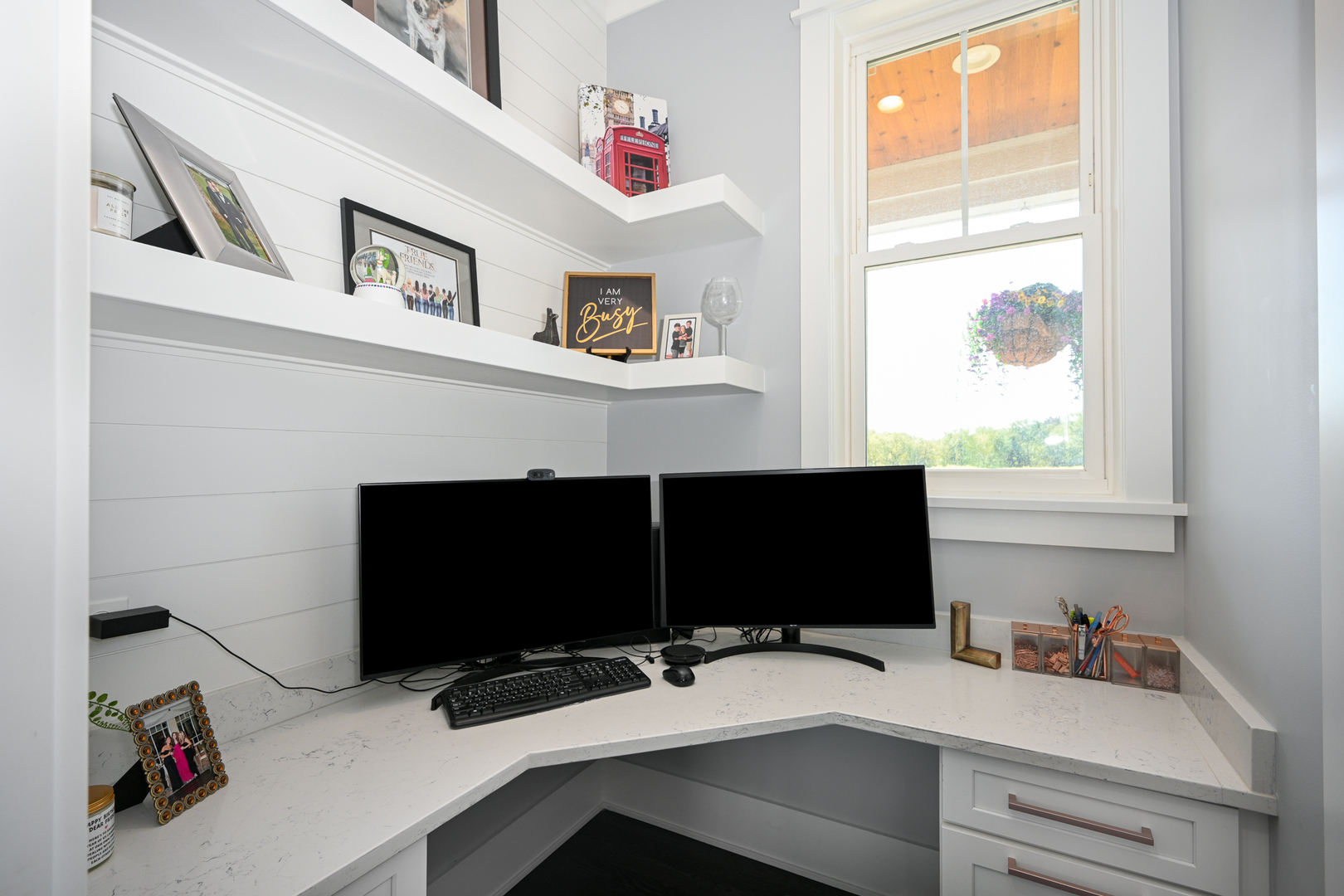 5-n107 Burr Road St. Charles, IL 60175 - Photo 16 of 54 a workstation with a computer on a desk and a bookshelf