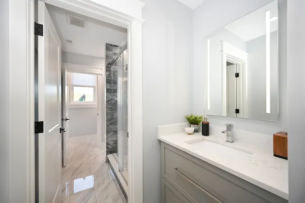 a view of a patio with a table and chairs