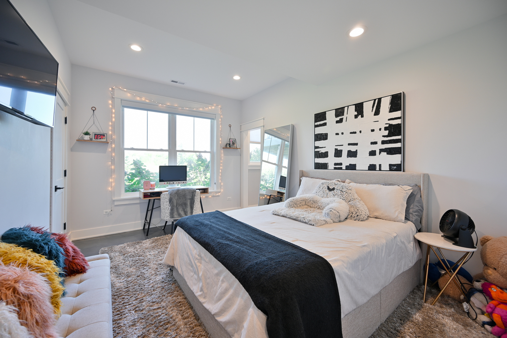 5-n107 Burr Road St. Charles, IL 60175 - Photo 40 of 54 a bedroom with a bed and a table in it with window