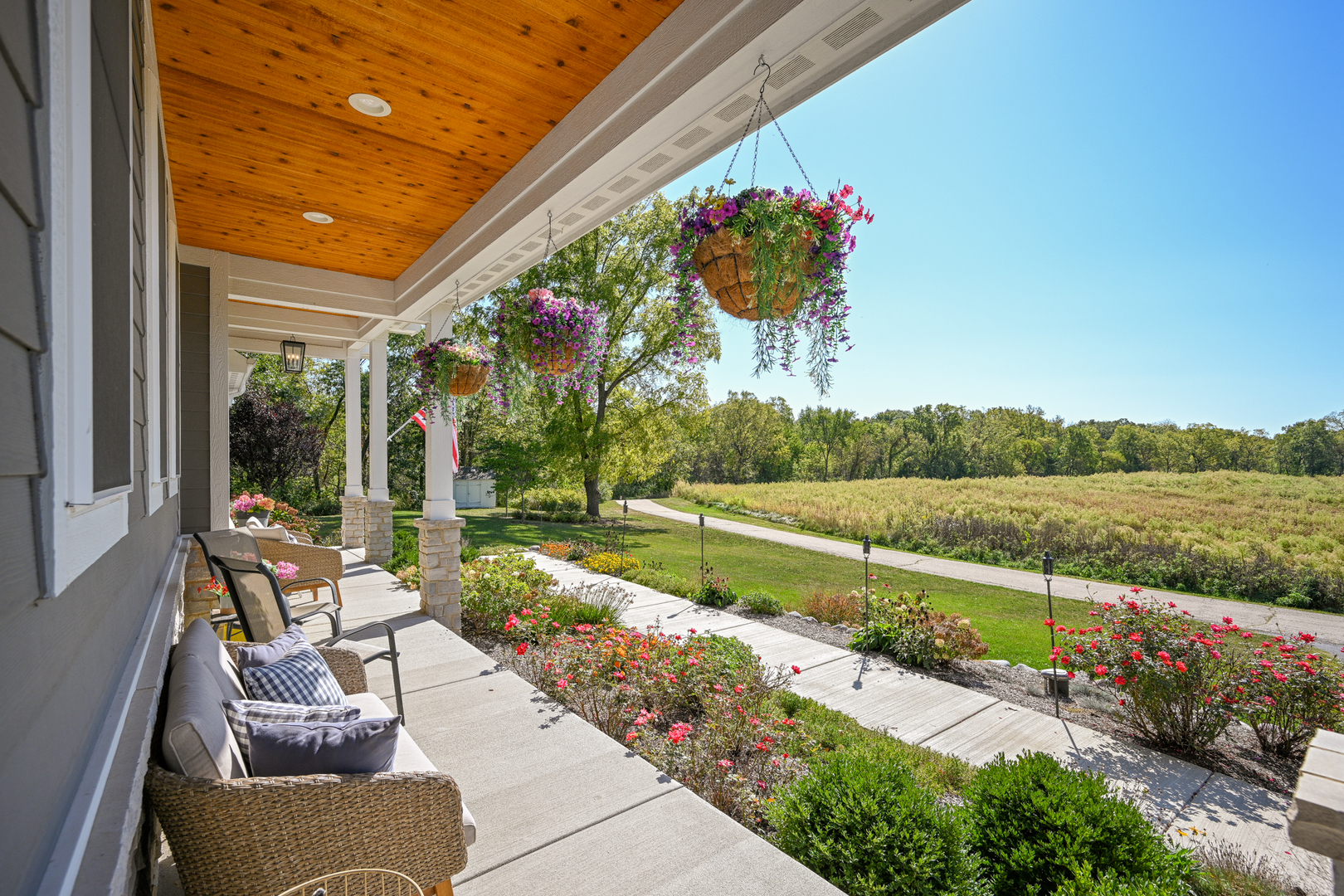 5-n107 Burr Road St. Charles, IL 60175 - Photo 5 of 54 a balcony with furniture and a garden