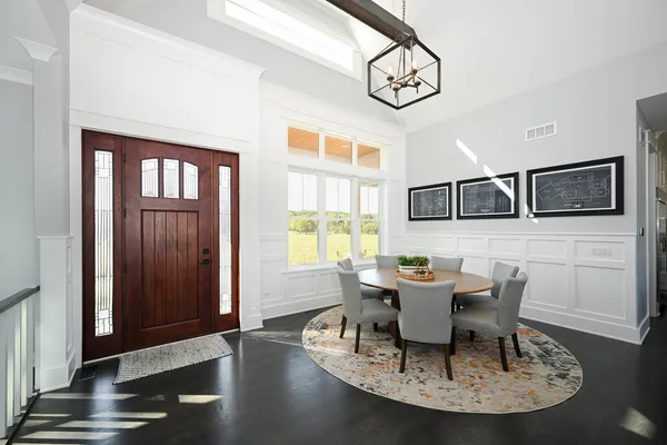 a kitchen with granite countertop a sink stainless steel appliances and cabinets