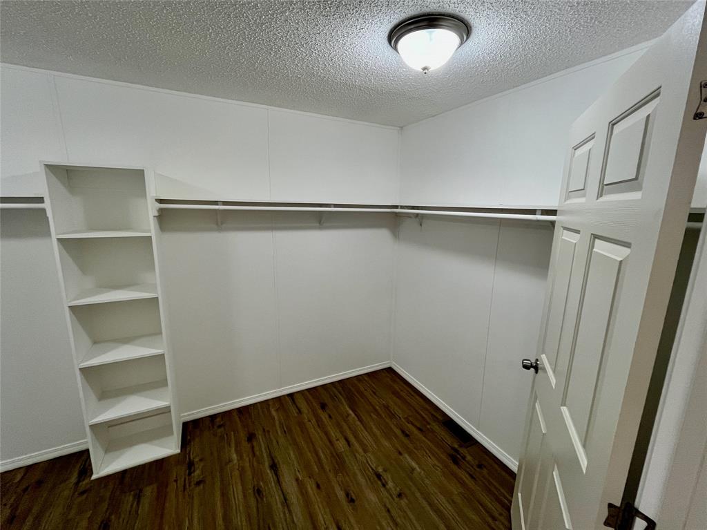 6913 Rice Road Shreveport, LA 71129 - Photo 15 of 26 a view of an empty walk in closet
