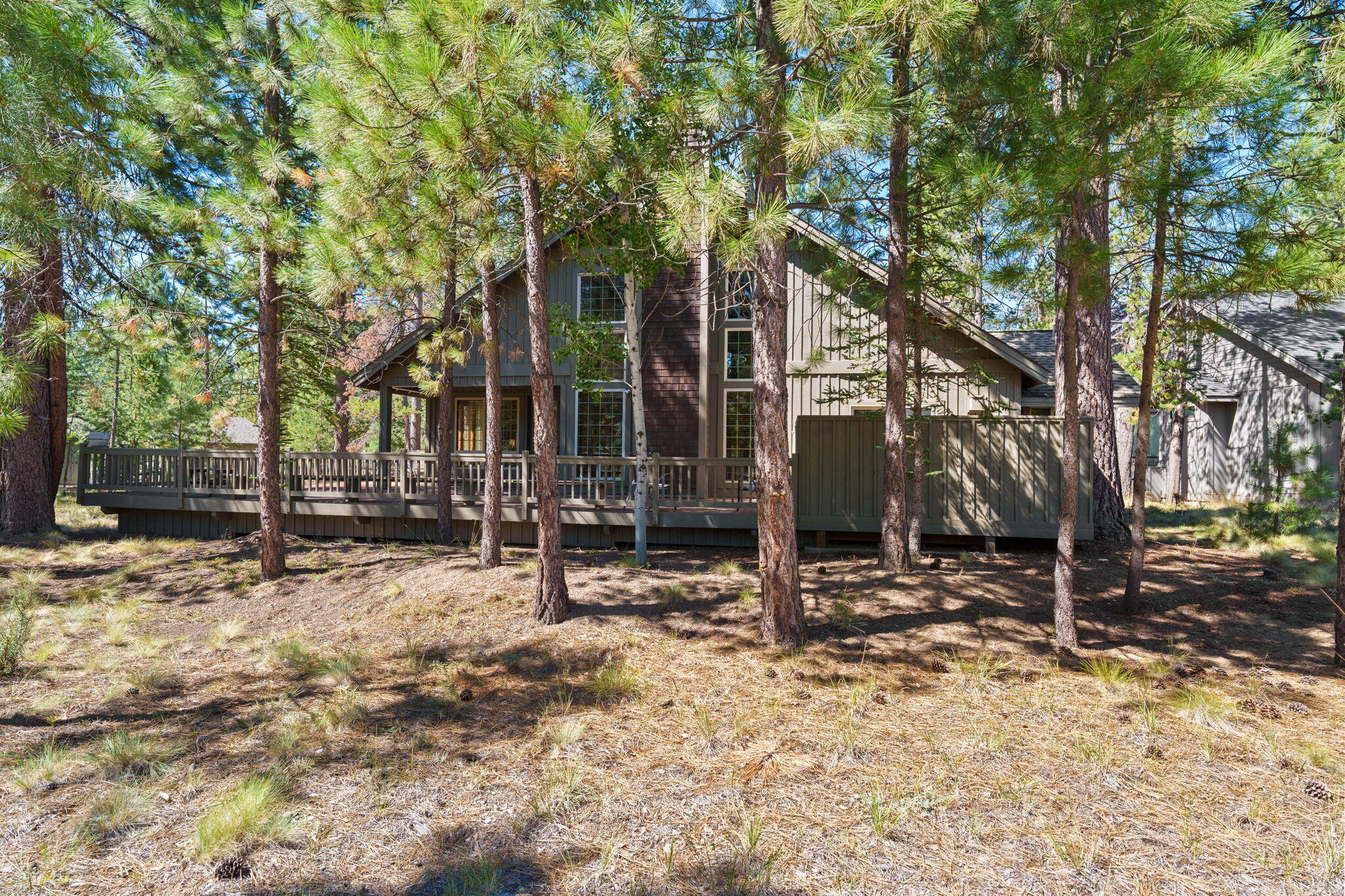 58026 Kinglet Road Sunriver, OR 97707 - Photo 33 of 39 a view of a house with snow on the ground