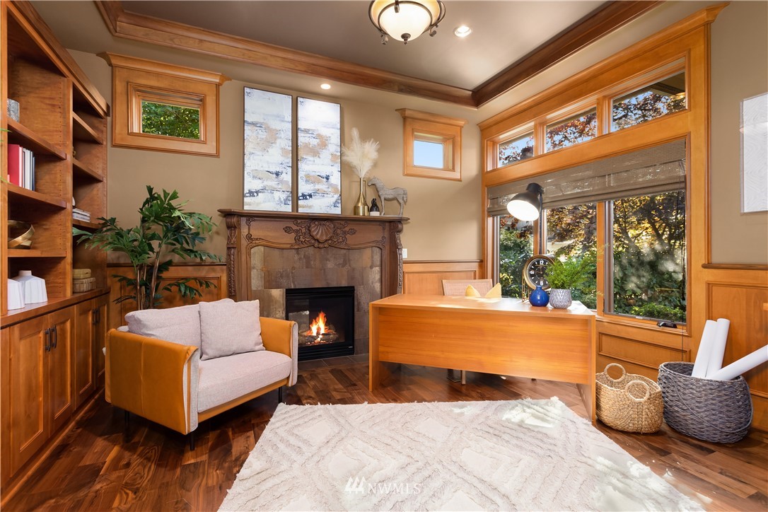 903 Belfair Road Bellevue, WA 98004 - Photo 11 of 36 a living room with furniture and a fireplace