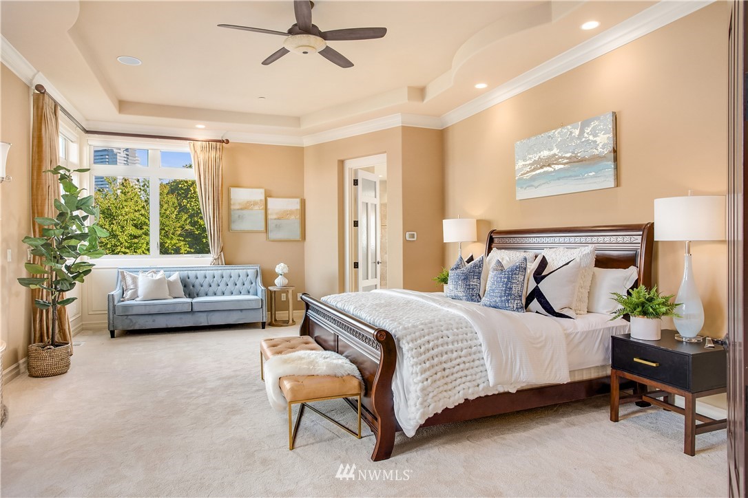 903 Belfair Road Bellevue, WA 98004 - Photo 13 of 36 a bedroom with a bed couch and window