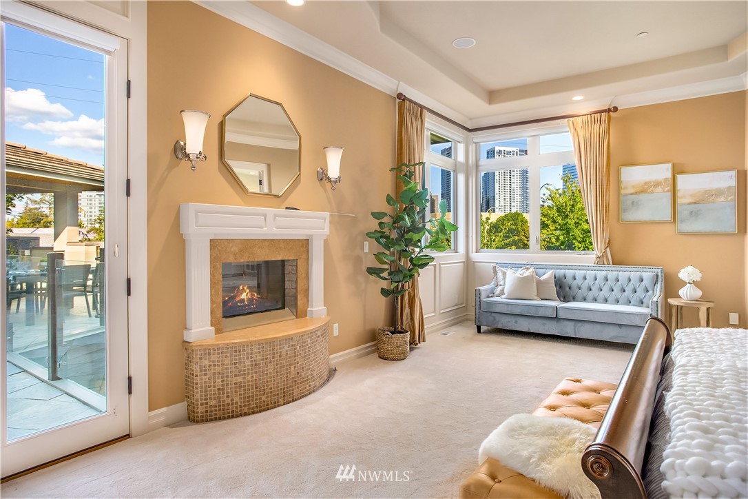 903 Belfair Road Bellevue, WA 98004 - Photo 14 of 36 a living room with furniture and a fireplace