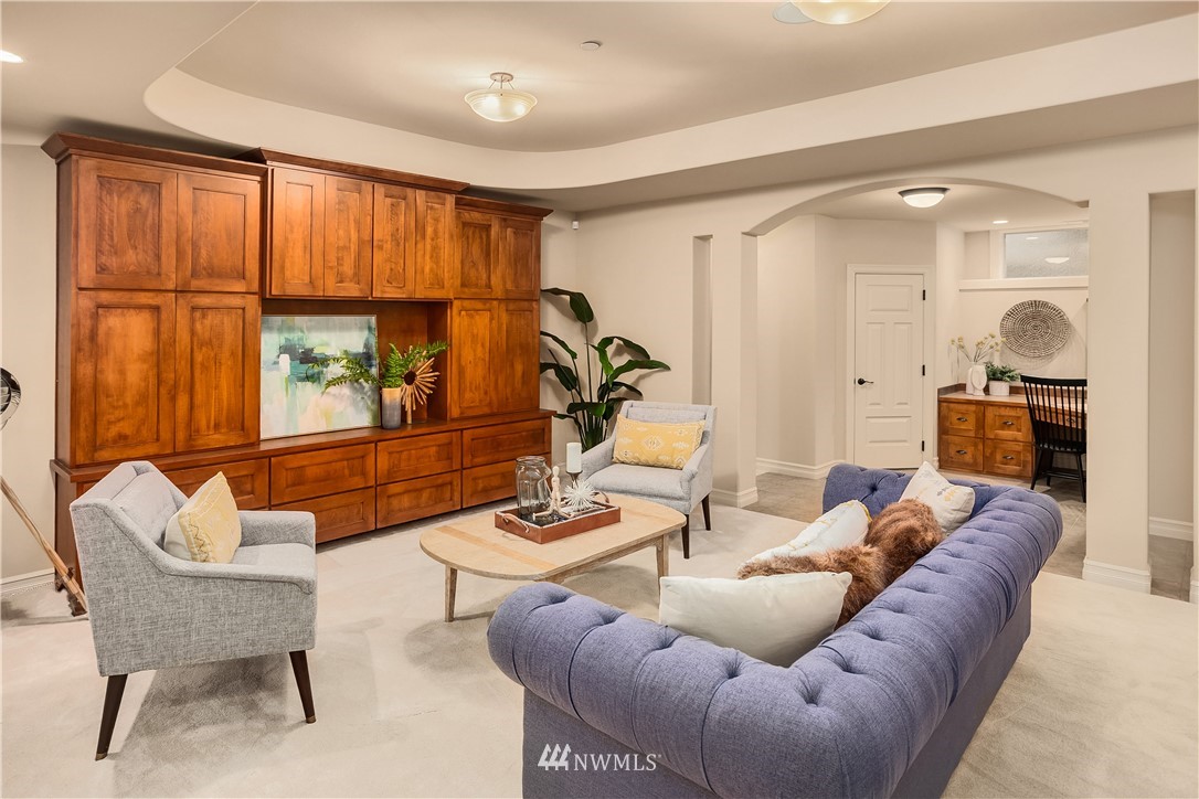 903 Belfair Road Bellevue, WA 98004 - Photo 21 of 36 a living room with furniture and a large window