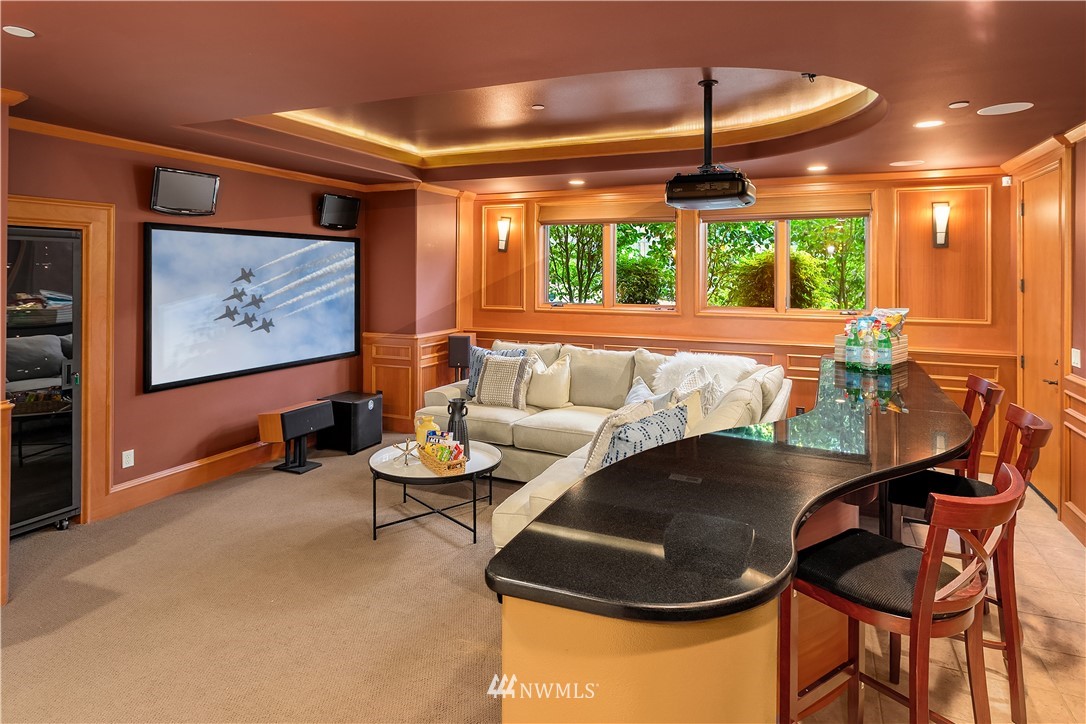 903 Belfair Road Bellevue, WA 98004 - Photo 22 of 36 a dining room with furniture and a large window