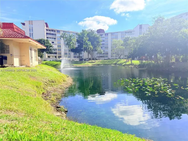 a view of a lake with a big yard