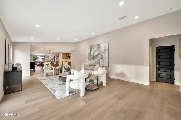 a kitchen with kitchen island a sink stainless steel appliances and cabinets