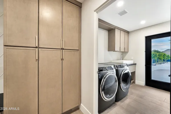 a view of a swimming pool with an outdoor space and seating area