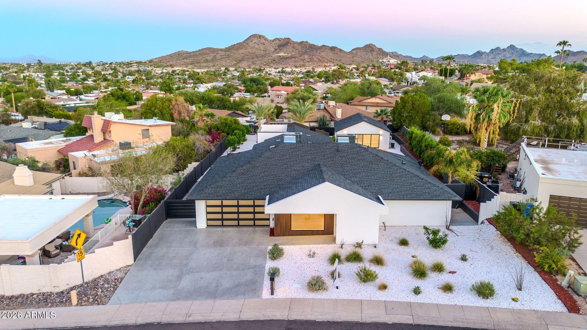 1955 East Greenway Road Phoenix, AZ 85022 - Photo 7 of 113 1955 E Greenway Rd Drone Twilight-1