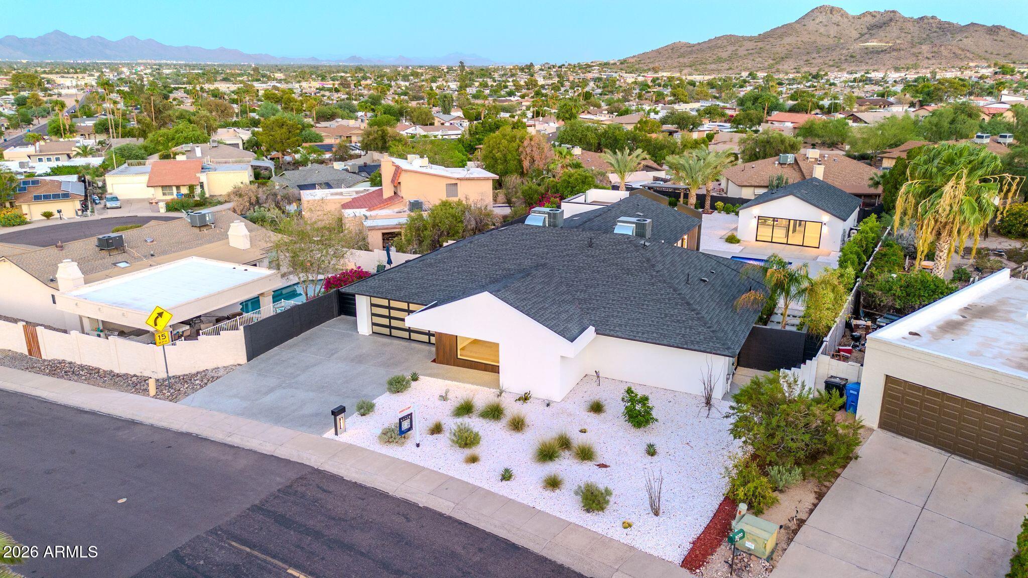 1955 East Greenway Road Phoenix, AZ 85022 - Photo 8 of 113 1955 E Greenway Rd Drone Twilight-2