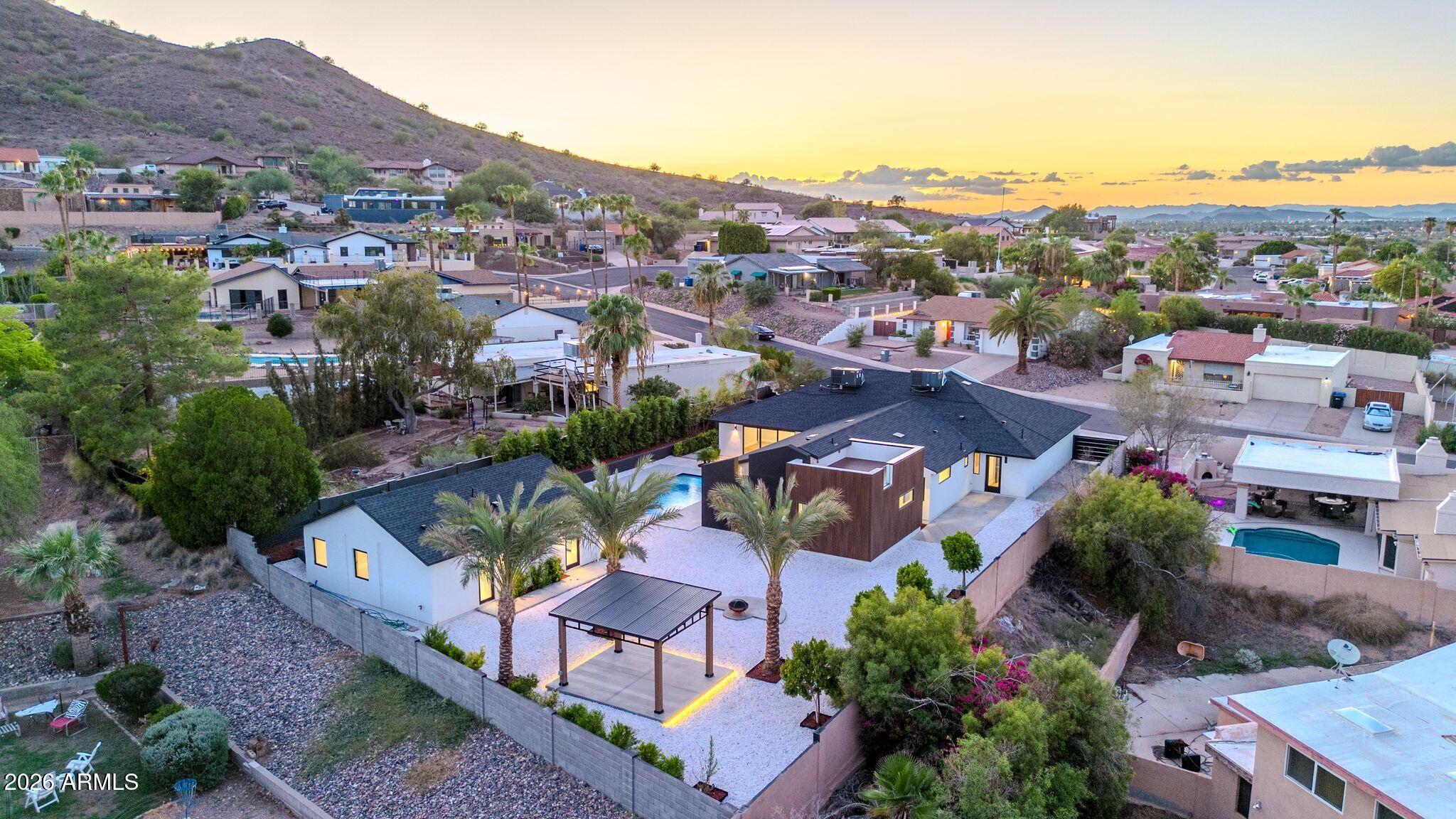 1955 East Greenway Road Phoenix, AZ 85022 - Photo 9 of 113 1955 E Greenway Rd Drone Twilight-6