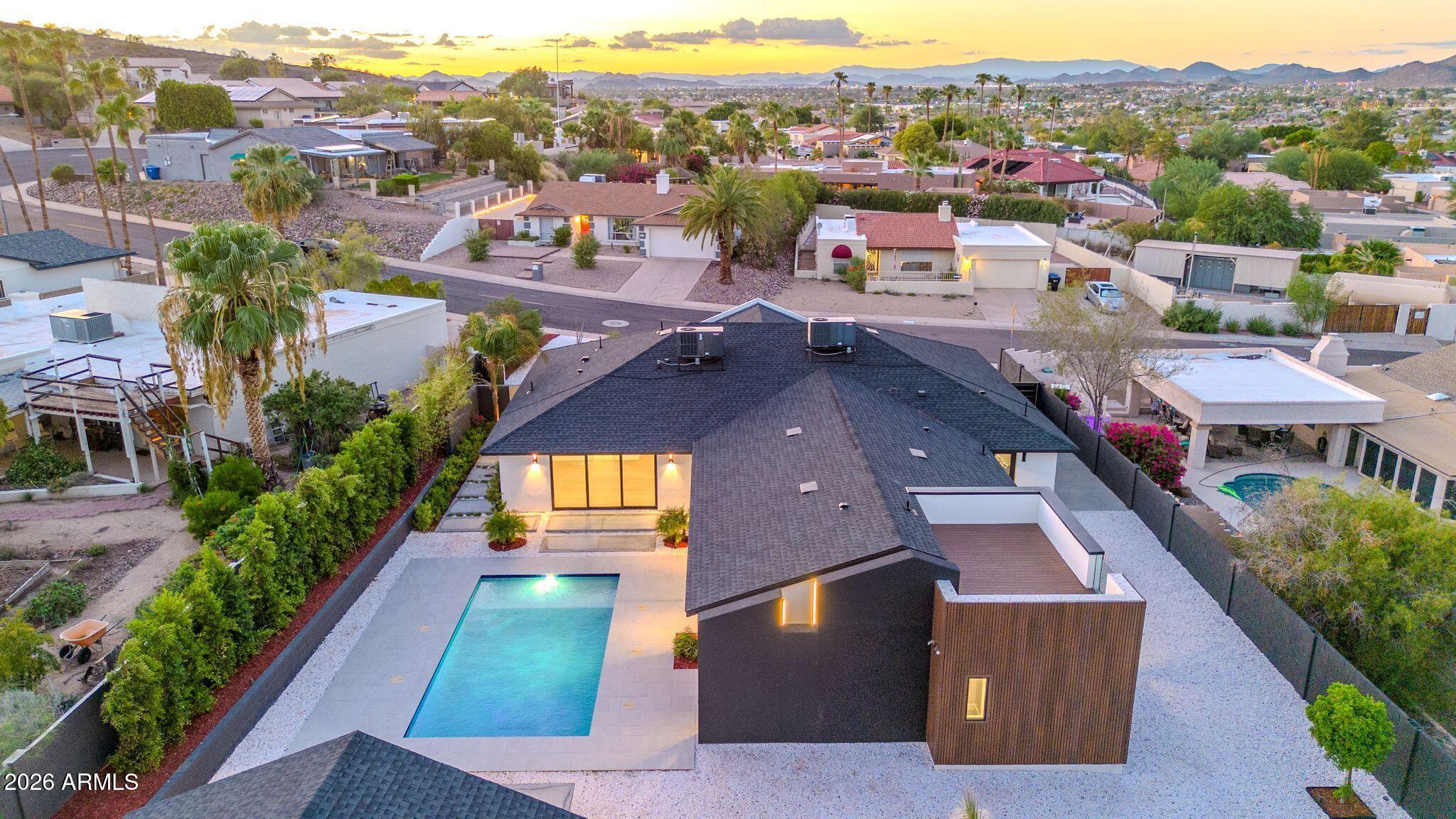 1955 East Greenway Road Phoenix, AZ 85022 - Photo 92 of 113 1955 E Greenway Rd Drone Twilight-3