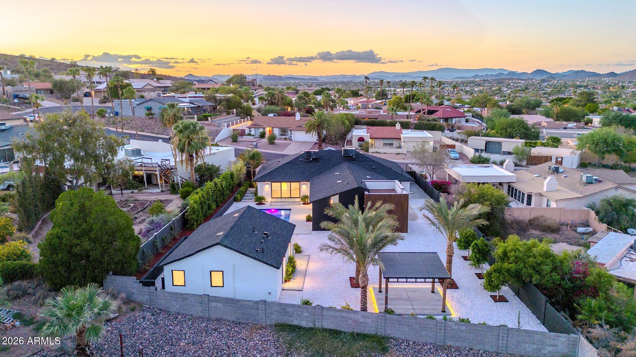 1955 East Greenway Road Phoenix, AZ 85022 - Photo 94 of 113 1955 E Greenway Rd Drone Twilight-5