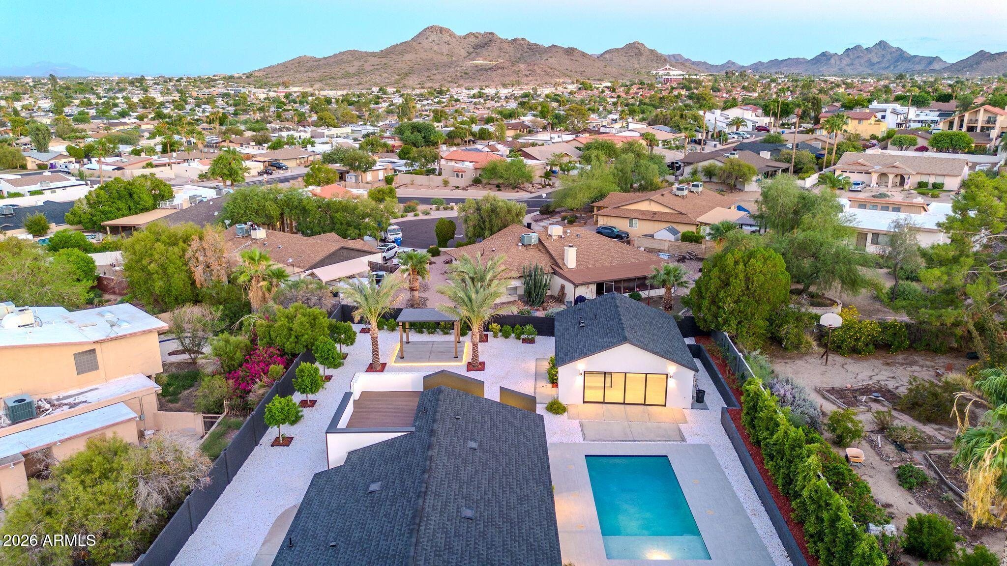 1955 East Greenway Road Phoenix, AZ 85022 - Photo 95 of 113 1955 E Greenway Rd Drone Twilight-7